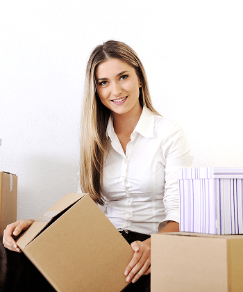 A woman holding a brown box