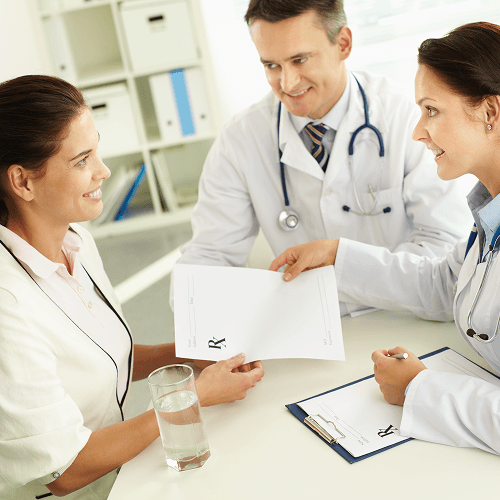 A doctor looking at brain MRI scans